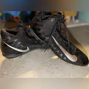 Alpha Menace Pro Mid: Black Metallic Silver Cleats